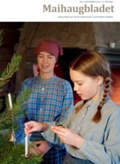 Maihaugbladet 3 2019 med forsidefoto av en jente med historiske klær som tenner et levende lys på et juletre.